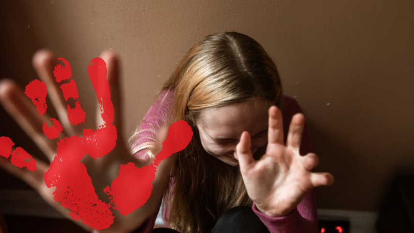 A photo of a scared girl, with hands in a gesture to make it stop, indicating an article about child sexual abuse prevention and consequences.