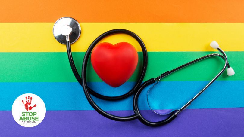 LGBTQ flag with a heart on it, indicating an article about suicide among LGBTQ youth, its risks and prevention.